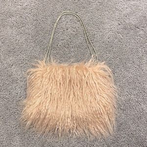 Zara blush furry clutch